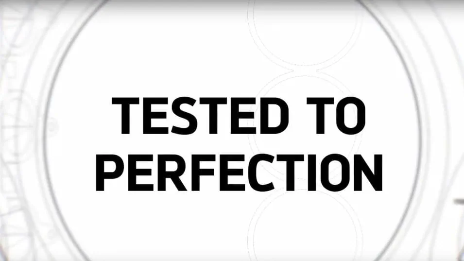 Image on a white background with faint grey circles on the outer side with black text "Tested to perfection" in the centre. 